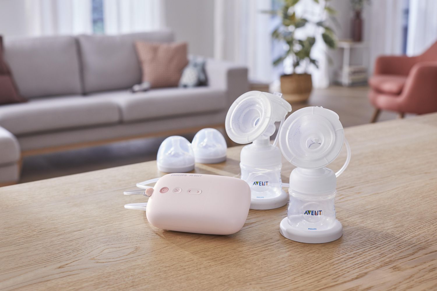 Double electric breast pump on a table